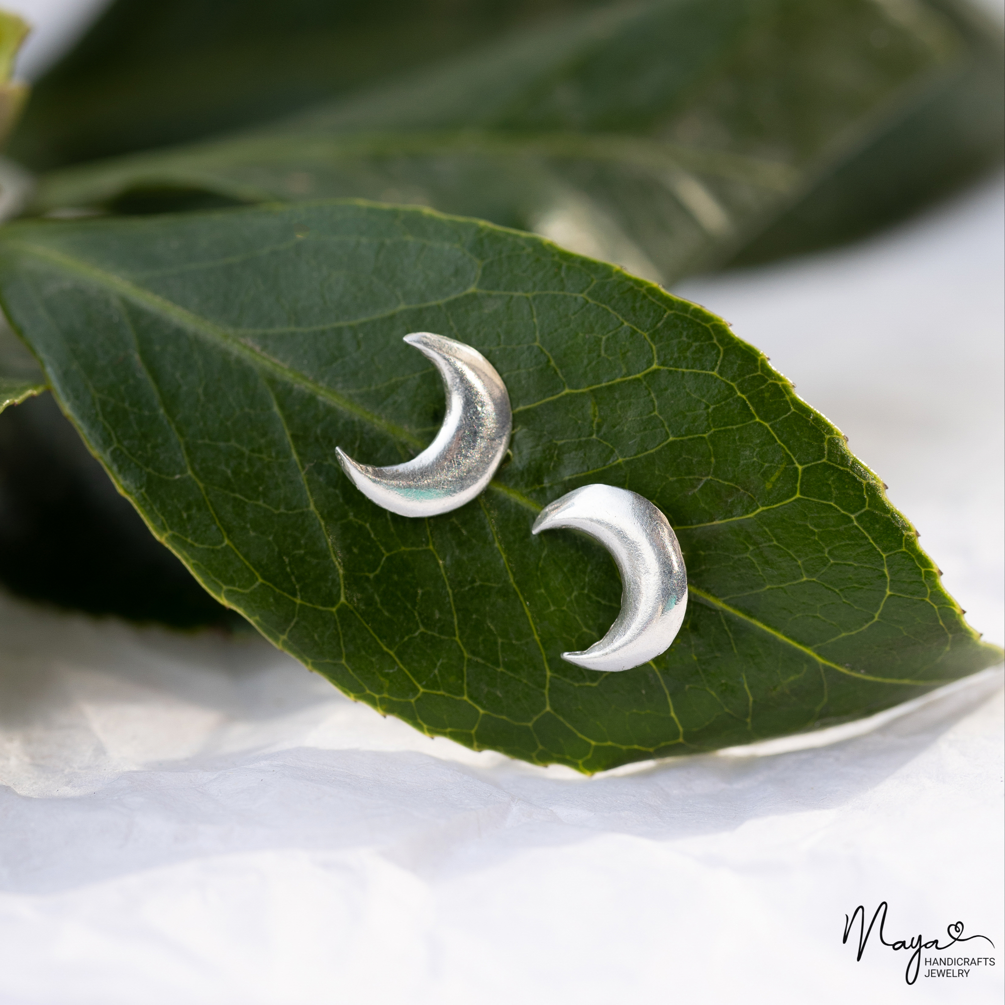 Crescent moon studs